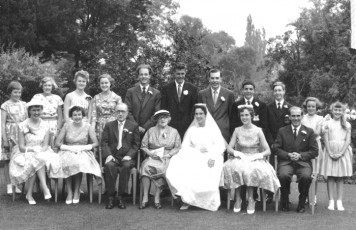 1959 Syd 2nd from rt, back row, at cousin Moira's Wedding